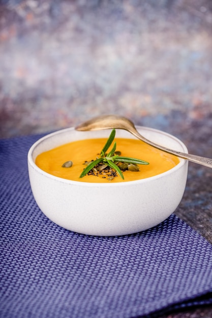 Delicious pumpkin soup puree with rosemary