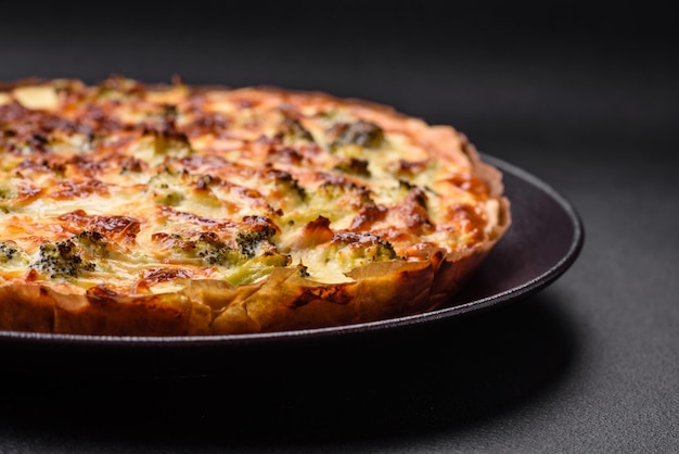 Delicious quiche with broccoli cheese chicken spices and herbs