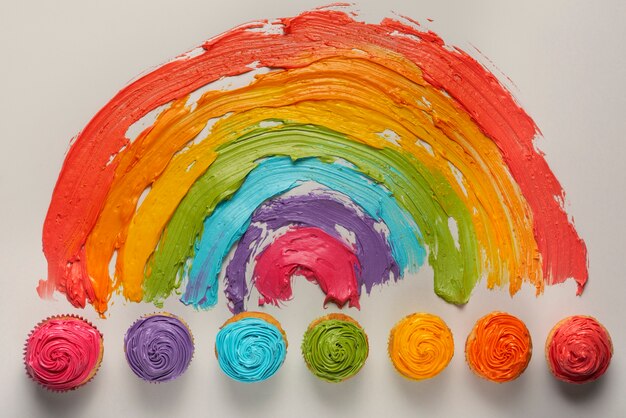 Photo delicious rainbow cupcakes still life