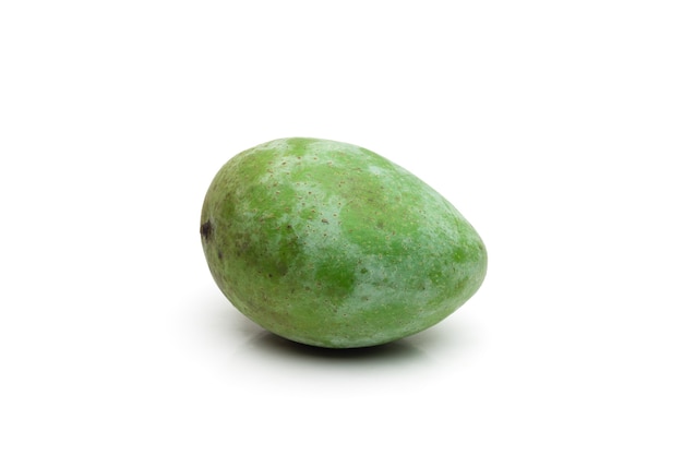 Delicious raw mango close up on isolated white background