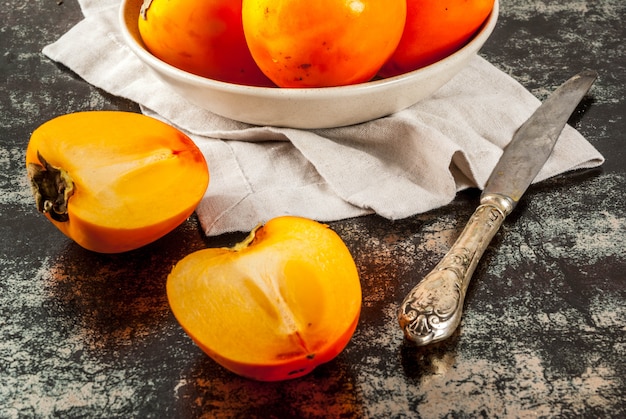 Delicious raw ripe persimmon fruits