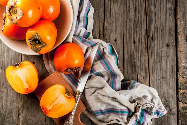 Delicious raw ripe persimmon fruits