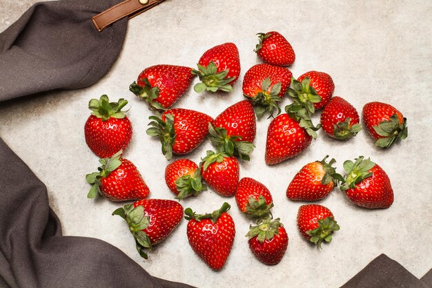 Delicious red strawberries on a marble table