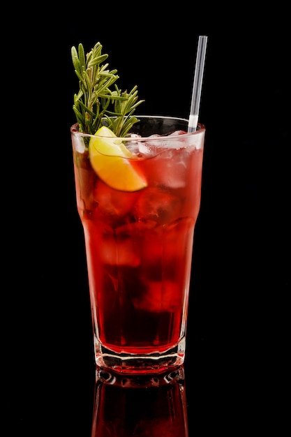 Delicious refreshing cocktail on a black background