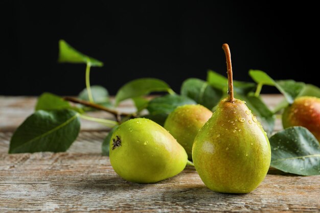 Delicious ripe pears on table