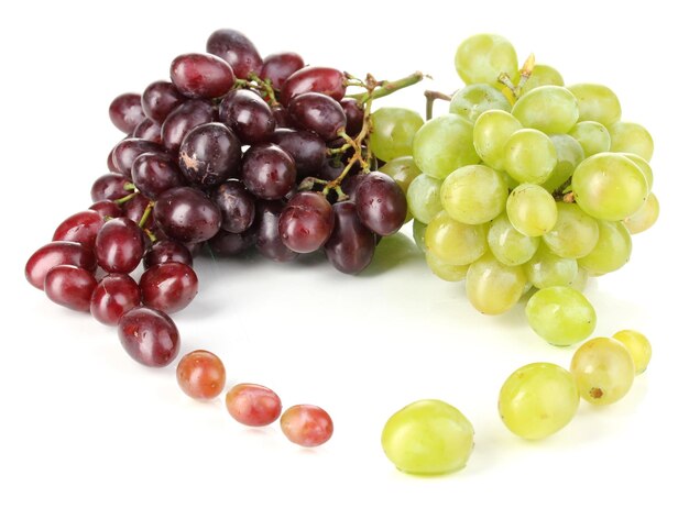 Delicious ripe pink and green grapes isolated on white