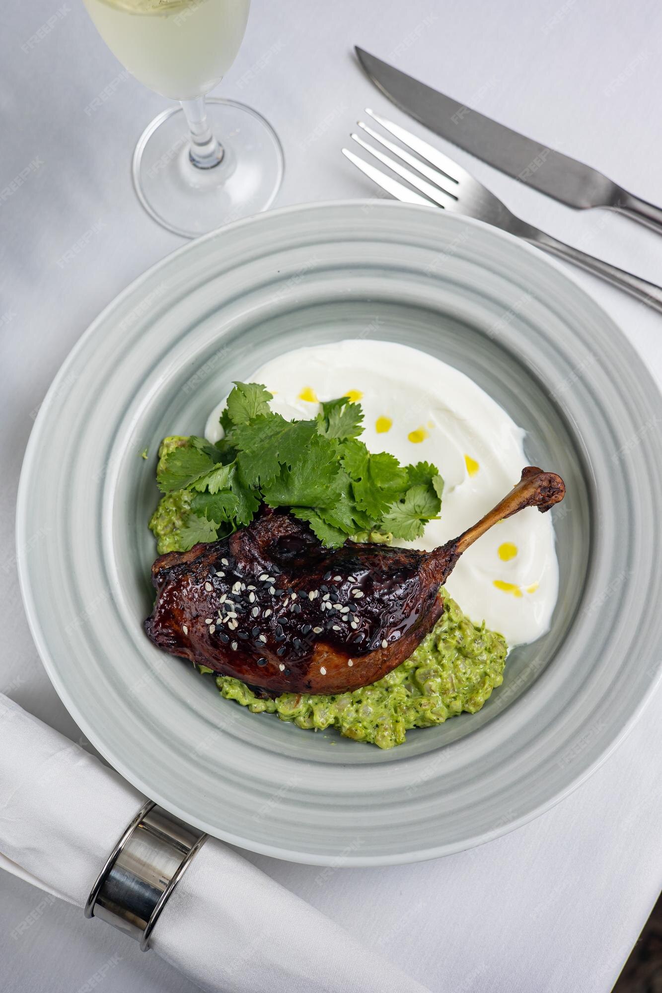 Premium Photo | Delicious roast duck in a restaurant