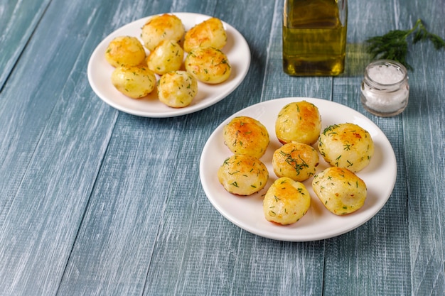 Delicious roasted young potatoes with dill,top view