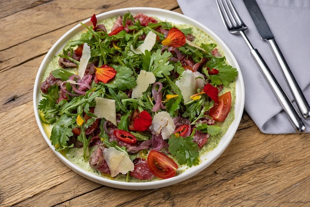 A delicious salad in a restaurant Closeup