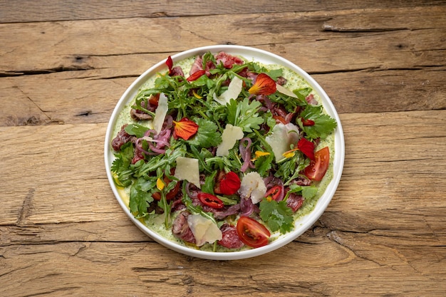 A delicious salad in a restaurant Closeup
