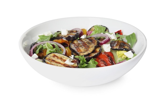 Delicious salad with roasted eggplant cheese and arugula isolated on white