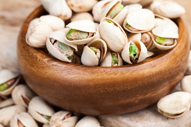 Delicious and salty pistachio nuts, roasted pistachios sprinkled with salt for flavor