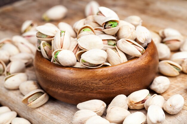 Delicious and salty pistachio nuts, roasted pistachios sprinkled with salt for flavor