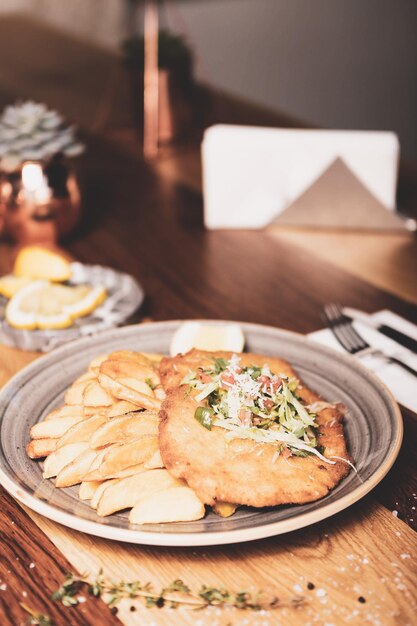 Delicious schnitzel served with french fries