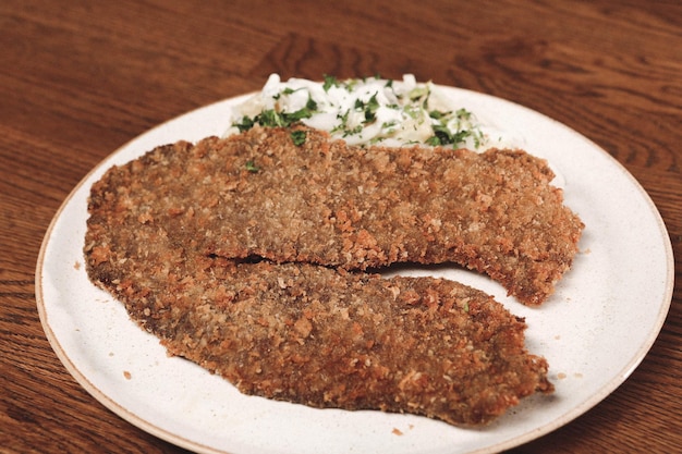 Delicious schnitzel served with french fries