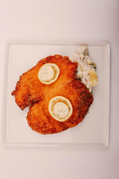 Delicious schnitzel served with french fries