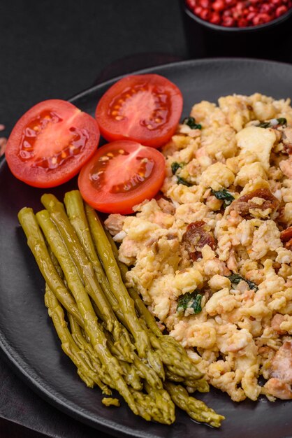 Delicious scramble with salmon sundried tomatoes spinach spices and herbs