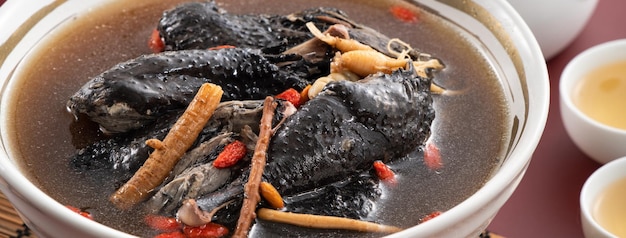 Delicious silky chicken soup with Chinese herbal medicine