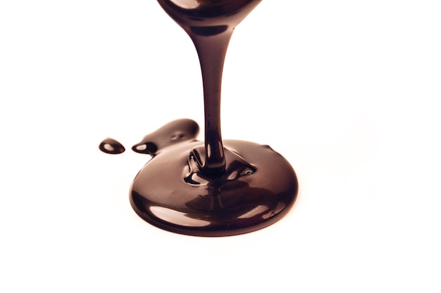 Delicious smooth chocolate sauce flowing chocolate sauce