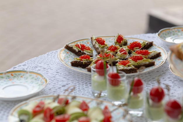 Delicious snacks on wedding reception table