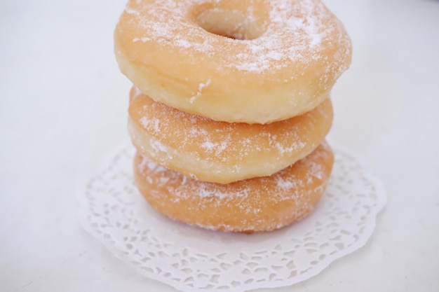 delicious snow donuts as a background