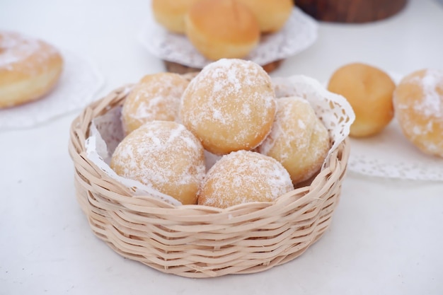 delicious snowball donuts as a background