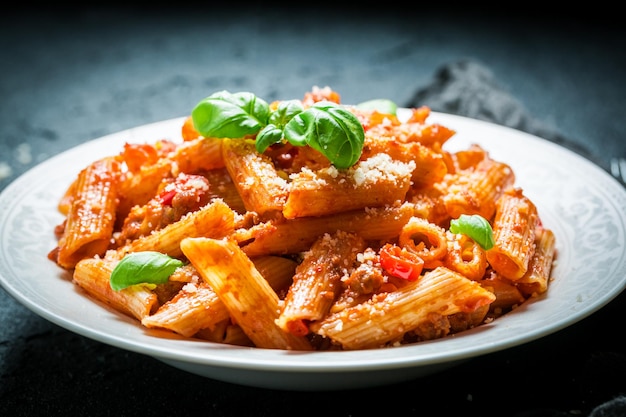 Delicious spaghetti bolognese with parmesan and basil