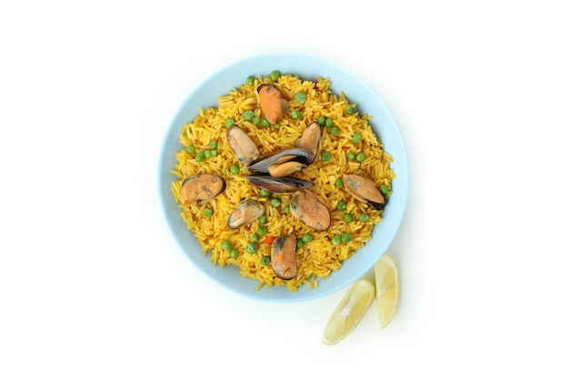 Delicious Spanish Paella isolated on white background