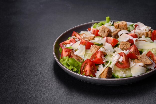 Delicious spring fresh vegetable salad with cherry tomatoes cucumber breadcrumbs and parmesan cheese