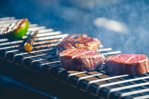 Delicious steak on grill