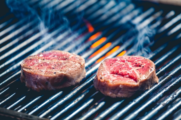 Delicious steak on grill