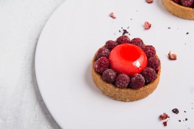 Delicious strawberry cake on a white plate