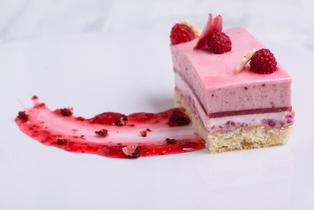 Delicious strawberry cake on a white plate