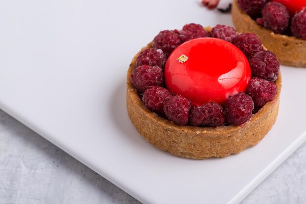 Delicious strawberry cake on a white plate