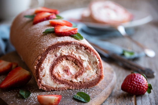 Delicious strawberry cake with white cream homemade baked dessert