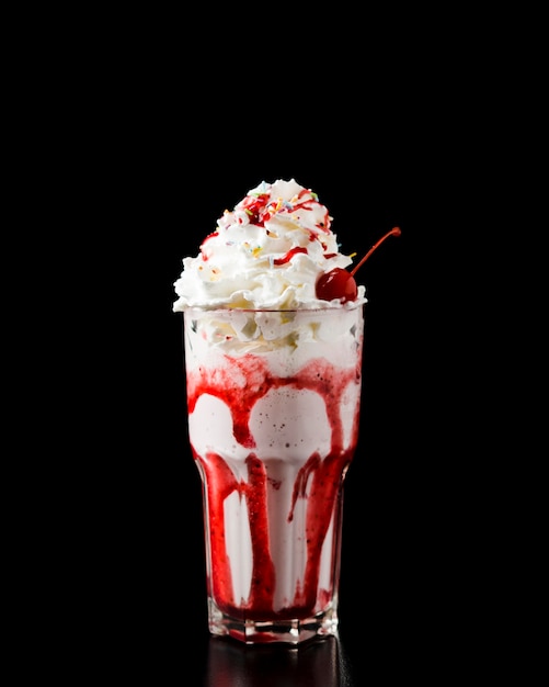 Delicious strawberry milkshake front view