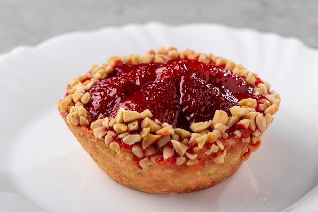 Delicious strawberry tartlet on the table