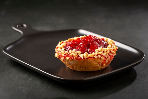 Delicious strawberry tartlet on the table