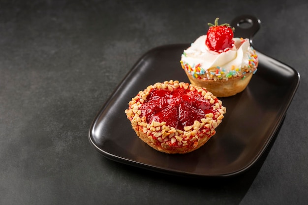 Delicious strawberry tartlet on the table