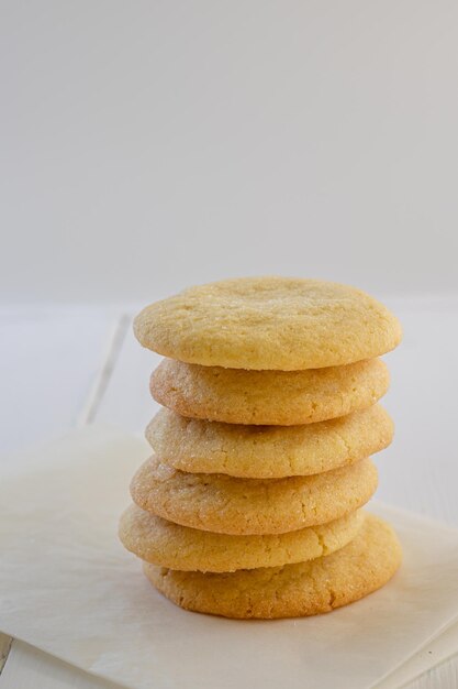 Delicious sugar cookies on wooden table closeup