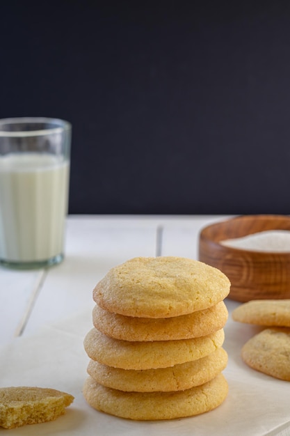 Delicious sugar cookies on wooden table closeup