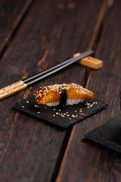 Delicious Sushi Nigiri on wooden background Traditional Japanese cuisine