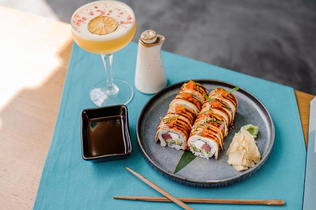 Delicious sushi rolls with a seafood on the served table at the restaurant