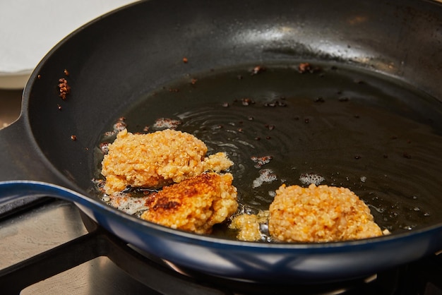 Delicious Swan Cutlets Being Fried in Home Kitchen Frying Pan