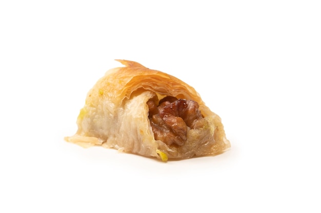 Delicious sweet baklava with walnuts isolated on white background