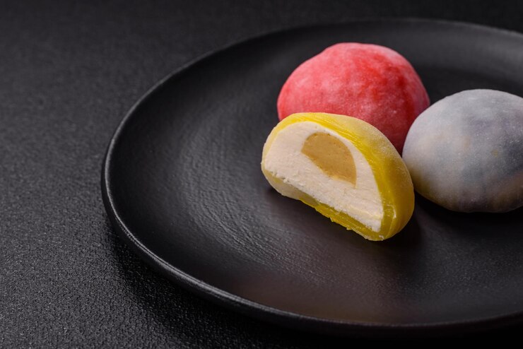 Photo delicious sweet chilled mochi desserts with fruit filling