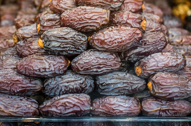 Delicious and sweet dried dates fruit background