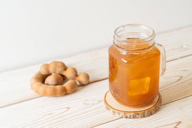 Delicious sweet drink tamarind juice and ice cube