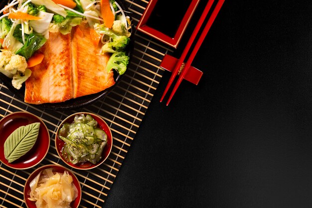 Delicious Teppanyaki Salmon grill food with vegetable in the iron pan