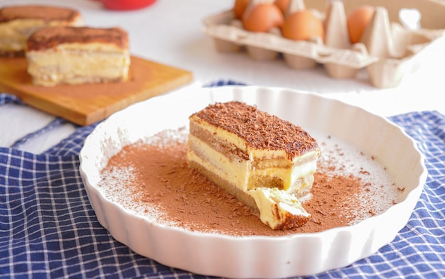 Delicious Tiramisu - traditional italian dessert from mascarpone cheese and biscuit